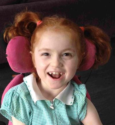 "Despite her complex physical disabilities, Ruby is cognitively able and is a bright, cheeky and smiley little girl who faces her daily challenges in an aspirational way," says Suzanne Hamilton. Image credit Suzanne Hamilton