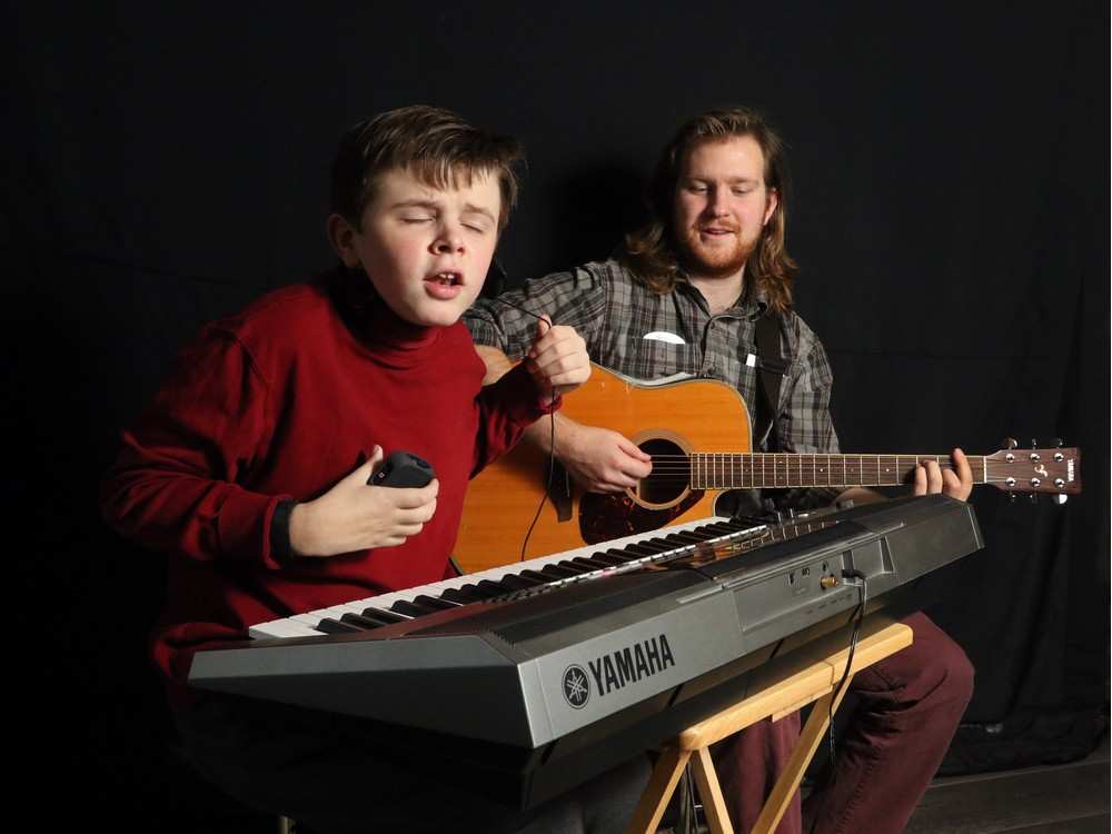Dylan Whitley, 16, who has been diagnosed with Autism and septo-optic dysplasia loves music. His keen ear, pitch perfect voice and talent for musical jingles keeps JB Music therapist Max Wood on his toes. Christina Ryan, Calgary Herald.